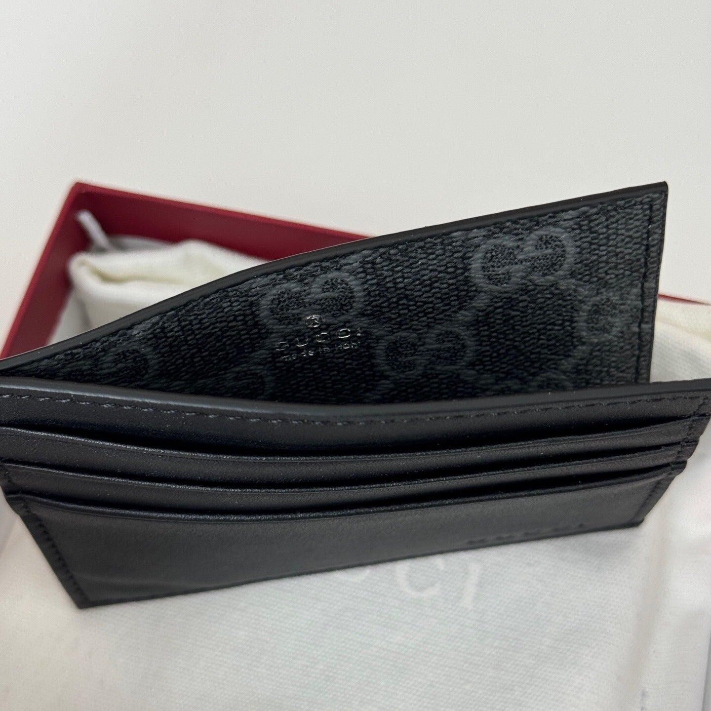 Gucci GG Emblem Embossed Card Case