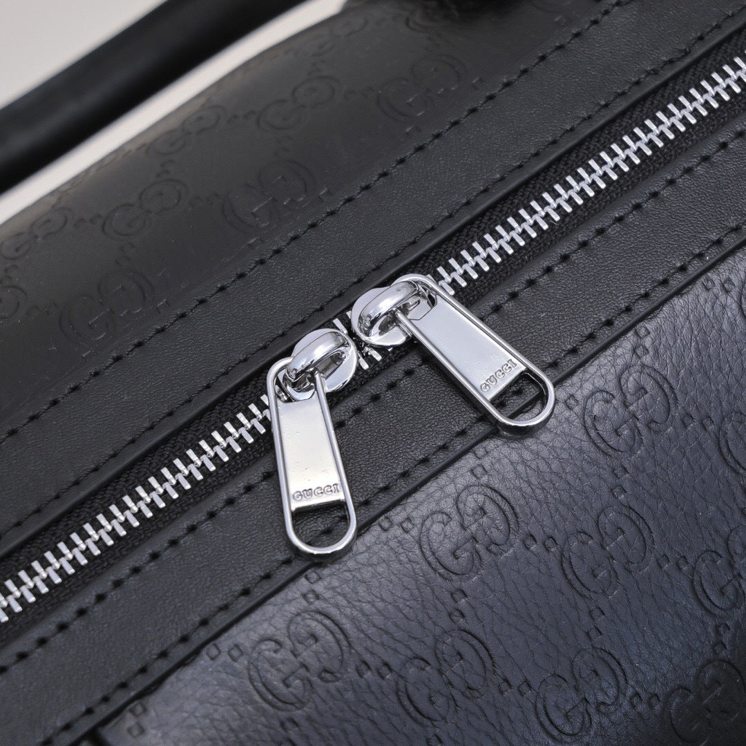 Gucci GG Embossed Duffle Bag