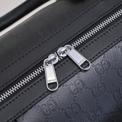 Gucci GG Embossed Duffle Bag