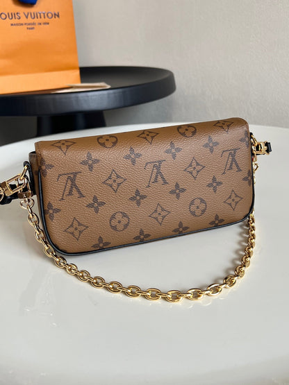 Louis Vuitton Wallet On Chain Ivy "Monogram Reverse"