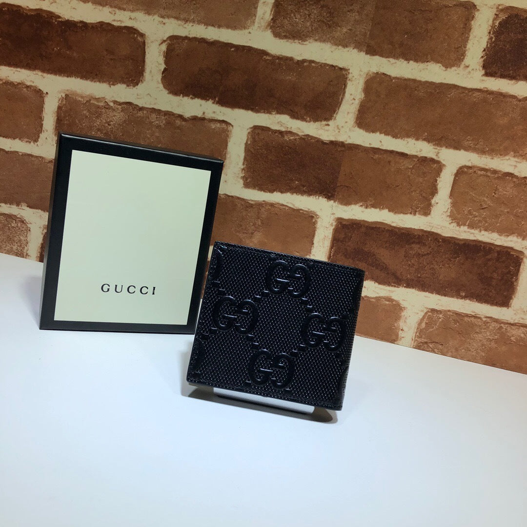 Gucci Textured Leather GG Embossed Bifold Wallet