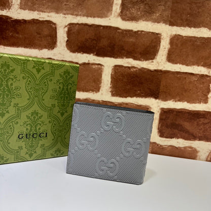 Gucci Textured Leather GG Embossed Bifold Wallet