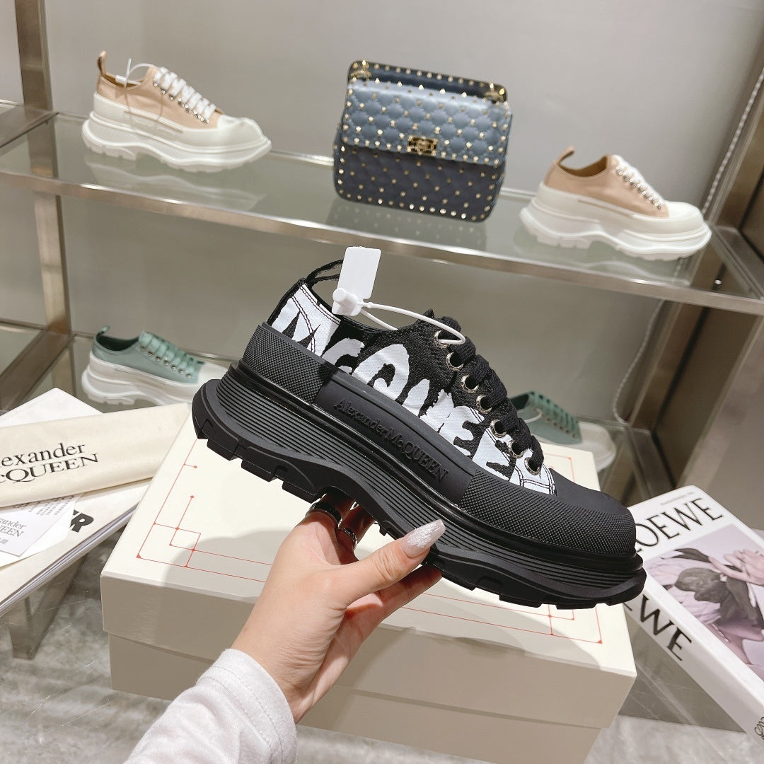 Alexander McQueen Tread Slick Low "Black-White Graffiti Logo"