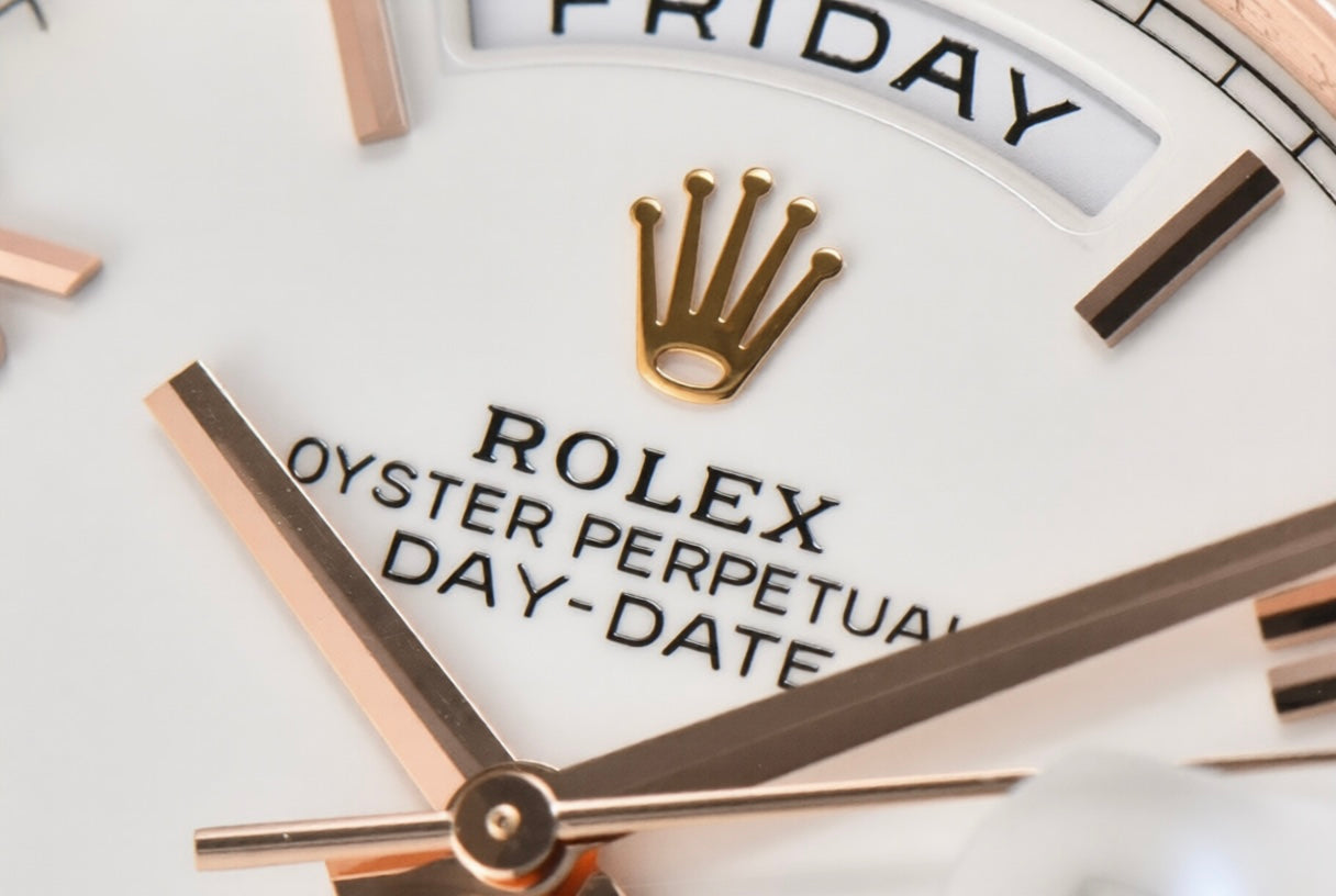 Rolex Day Date 40mm Rose Gold President Bracelet Roman White Dial