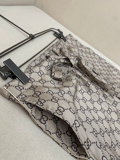 Gucci GG Supreme Print Silk Trousers "Beige"