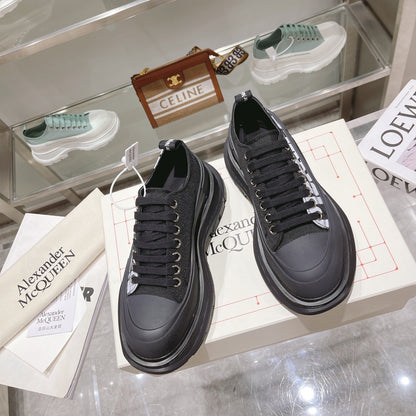 Alexander McQueen Tread Slick Low "Black-White Graffiti Logo"
