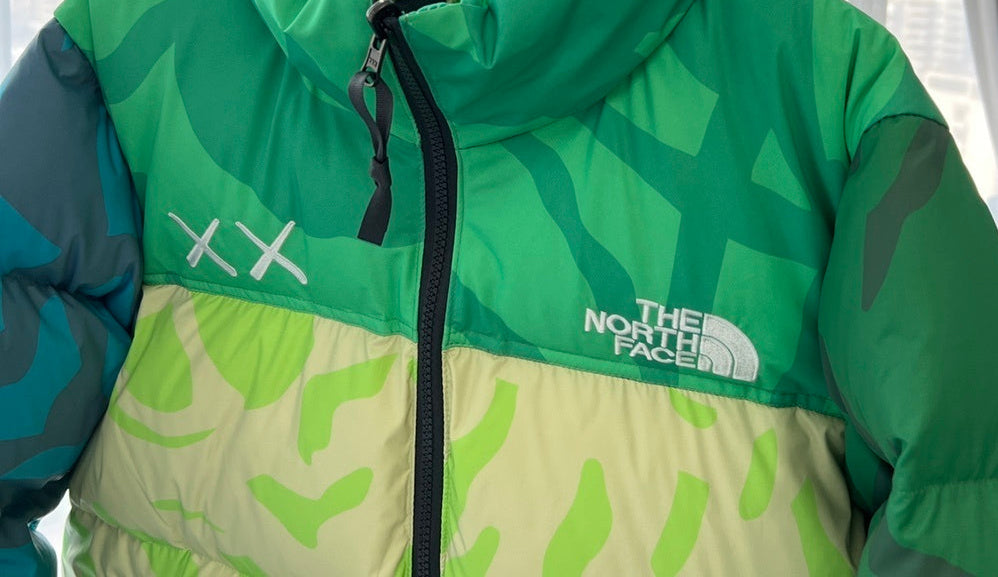 KAWS x The North Face Nuptse Down Jacket "Safety Green"