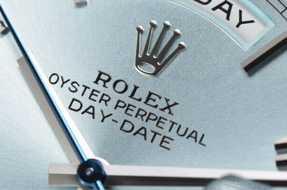 Rolex Day Date 40mm on President Bracelet Ice Blue Roman Dial