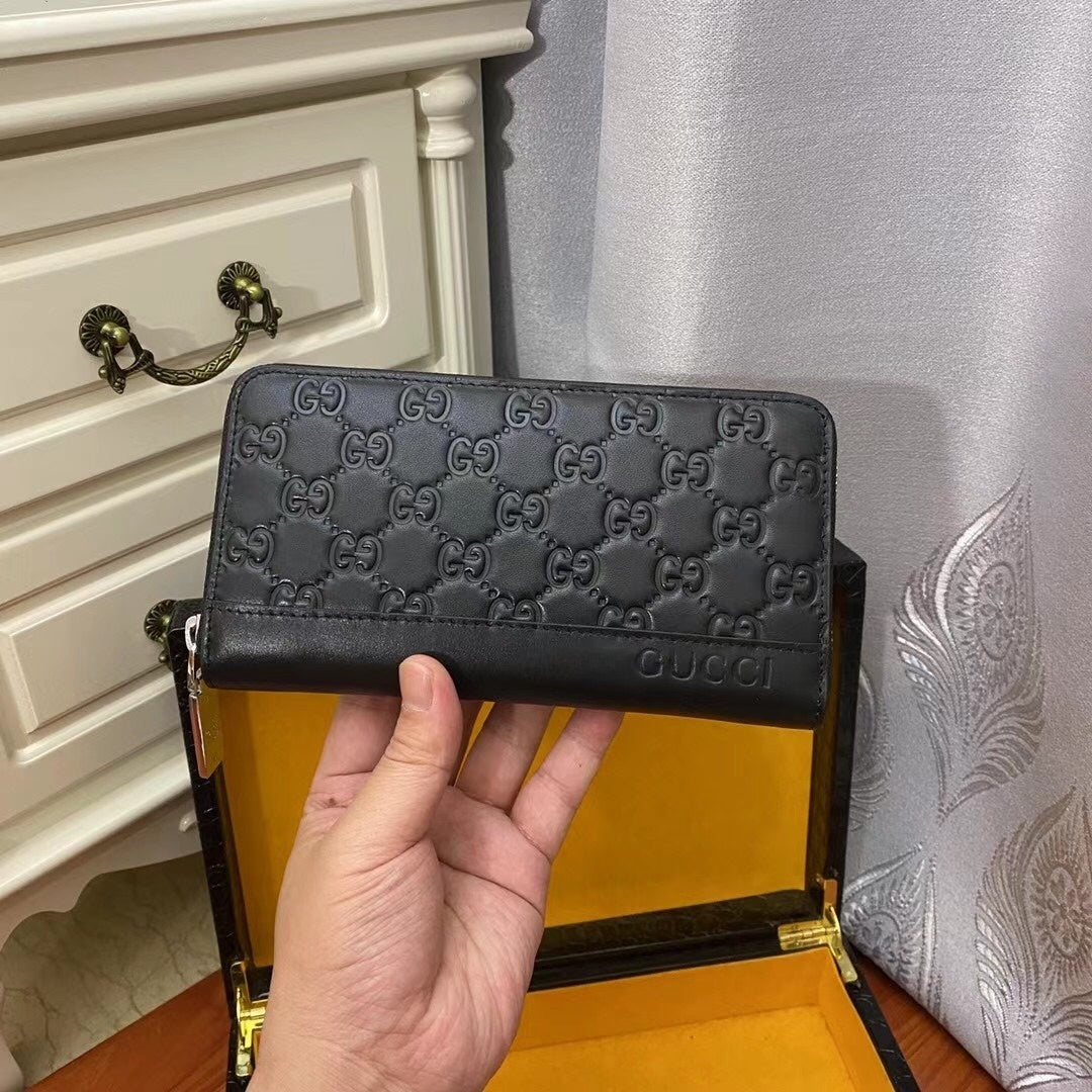 Gucci GG Leather Embossed Zip Around Wallet