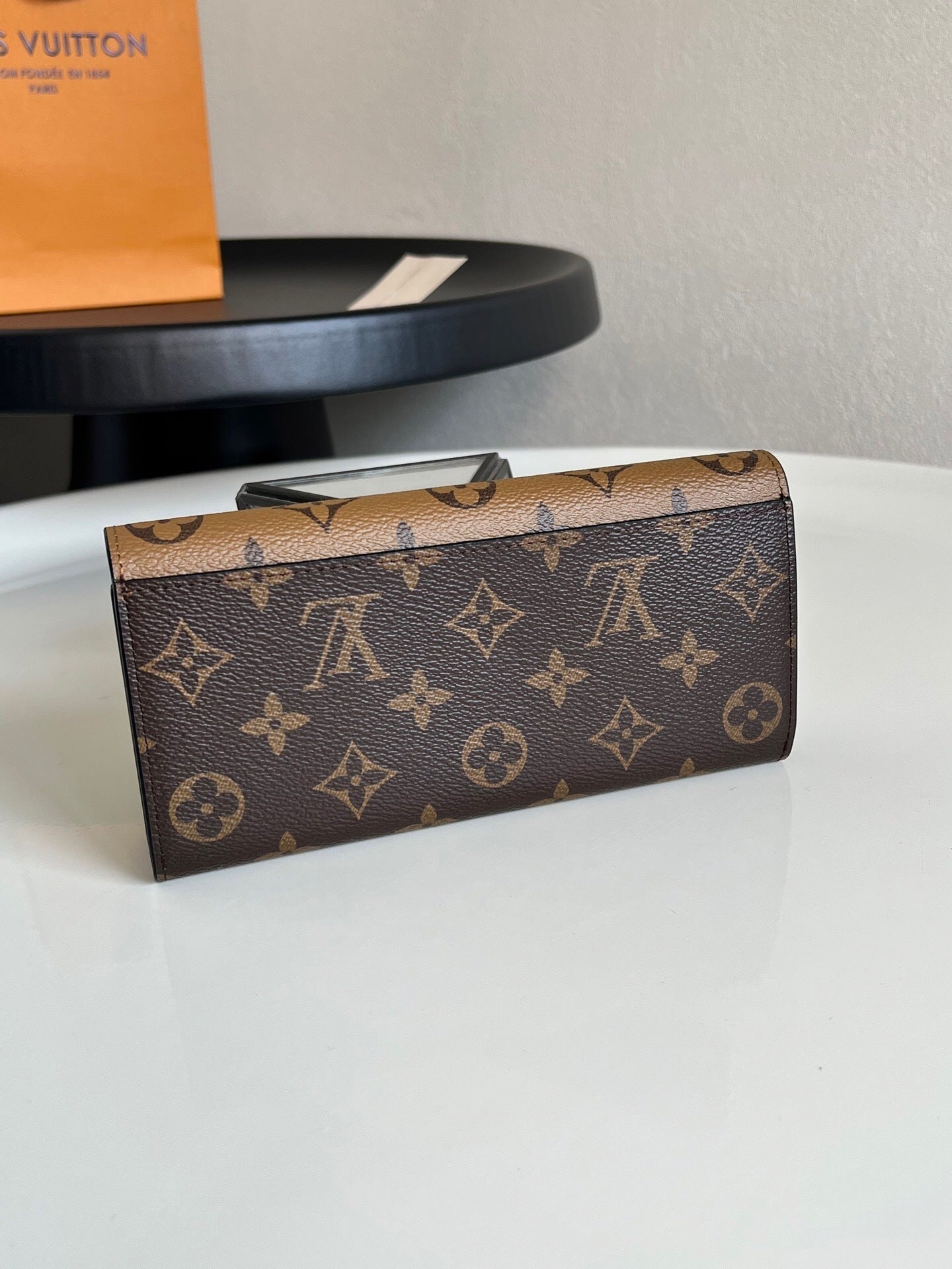 Louis Vuitton Emilie Wallet "Monogram Reverse"