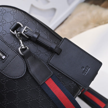 Gucci GG Embossed Duffle Bag