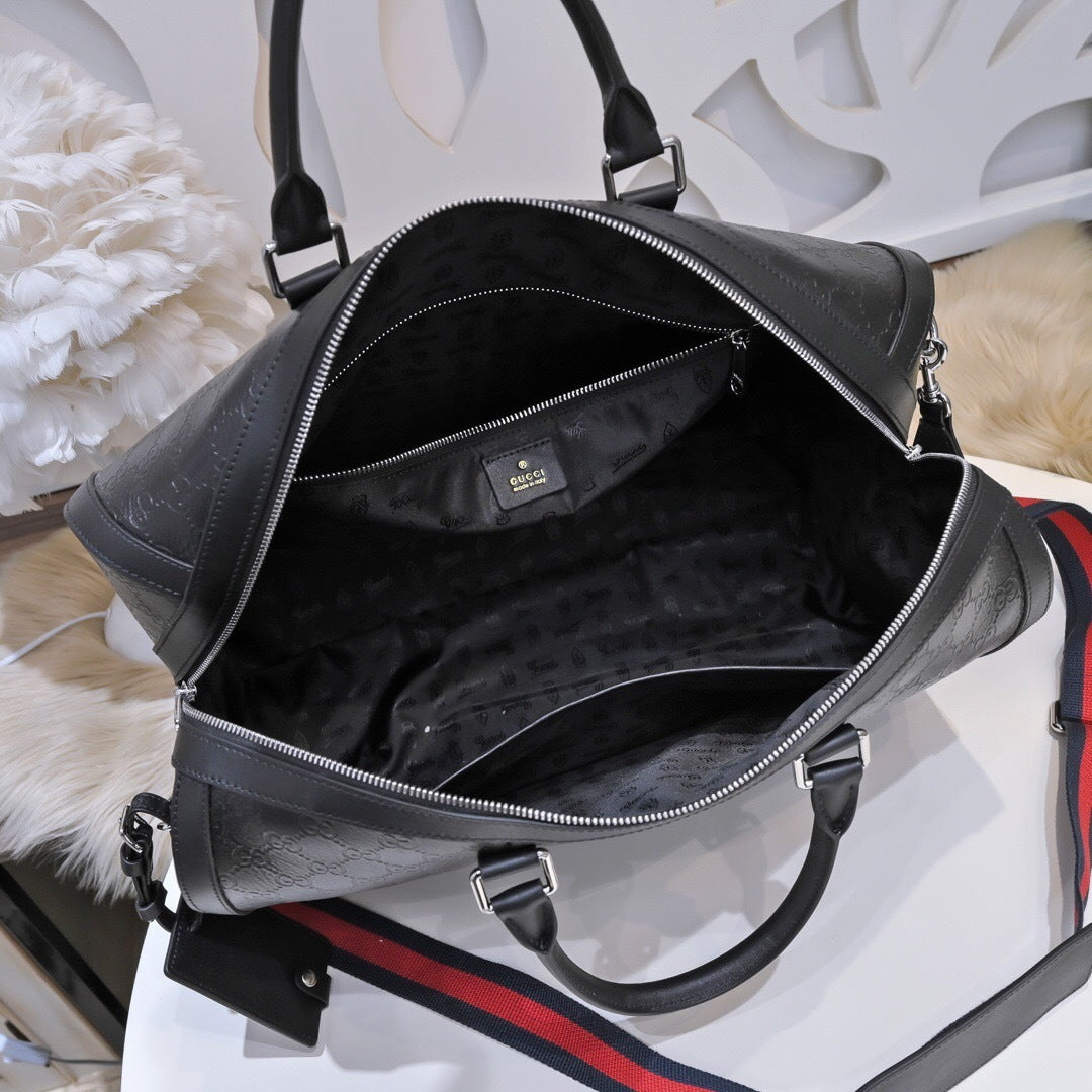 Gucci GG Embossed Duffle Bag