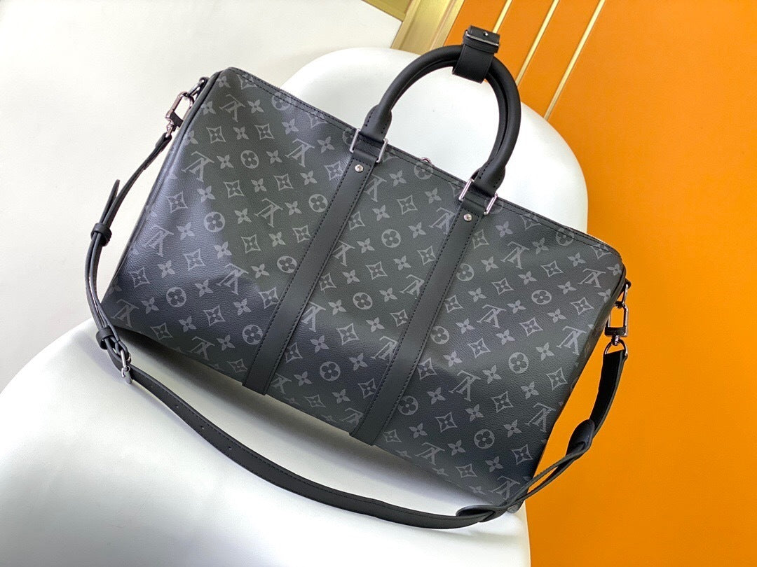Louis Vuitton Keepall Bandoulière 55 Duffel Bag