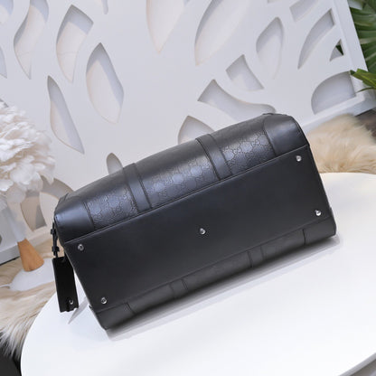 Gucci GG Embossed Duffle Bag