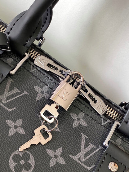 Louis Vuitton Keepall Bandoulière 55 Duffel Bag