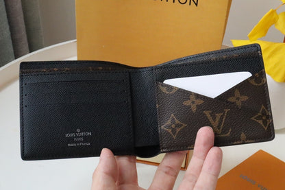 Louis Vuitton Multiple Wallet "Monogram Macassar Canvas"