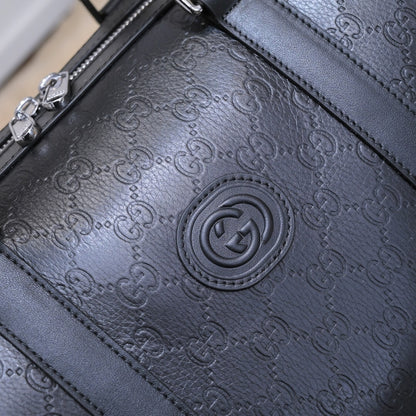 Gucci GG Embossed Duffle Bag