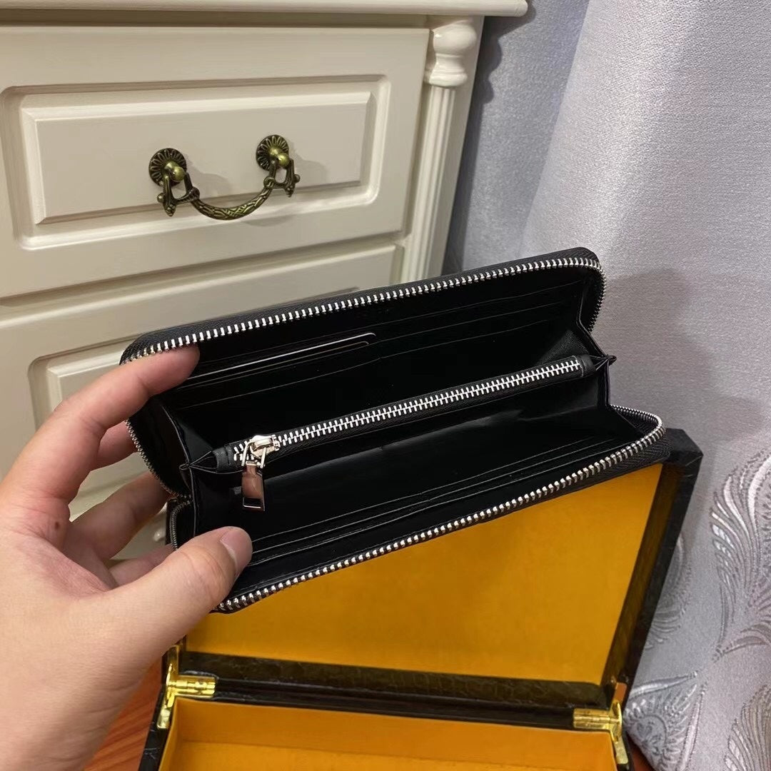 Gucci GG Leather Embossed Zip Around Wallet