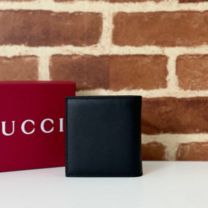 Gucci GG Emblem Bi-Fold Embossed Leather Wallet