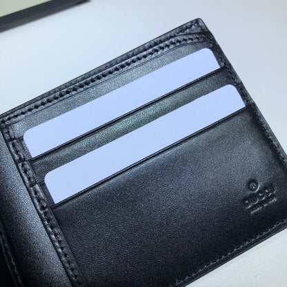 Gucci Textured Leather GG Embossed Bifold Wallet