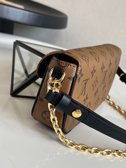 Louis Vuitton Wallet On Chain Ivy "Monogram Reverse"