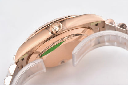 Rolex Day Date 40mm Rose Gold President Bracelet Green Roman Dial