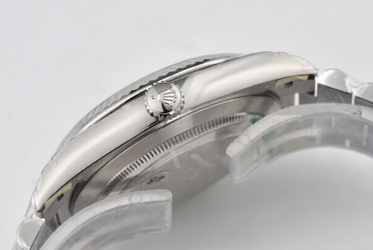 Rolex Day Date 40mm on President Bracelet Ice Blue Roman Dial