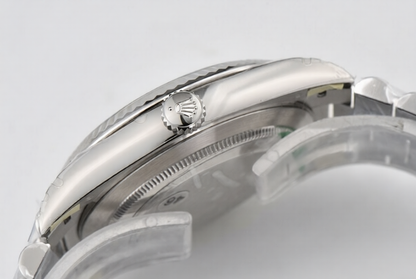Rolex Day Date 40mm on President Bracelet Ice Blue Roman Dial