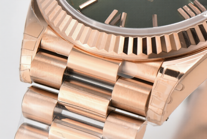 Rolex Day Date 40mm Rose Gold President Bracelet Green Roman Dial