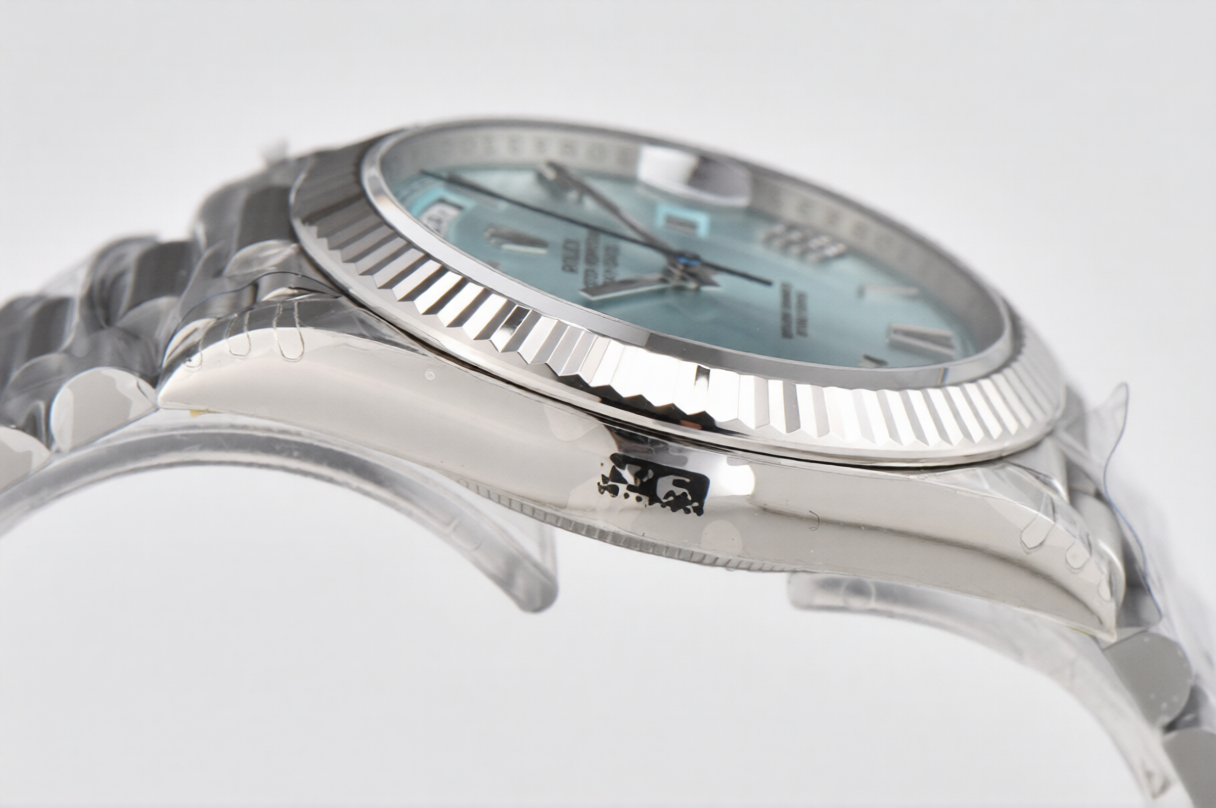 Rolex Day Date 40mm on President Bracelet Ice Blue Roman Dial
