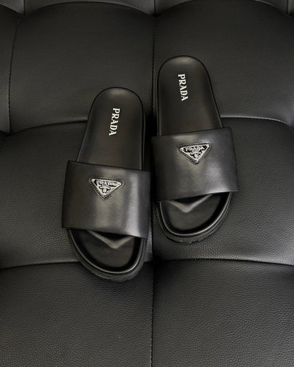 Prada Nappa Leather Padded Slides "Black"