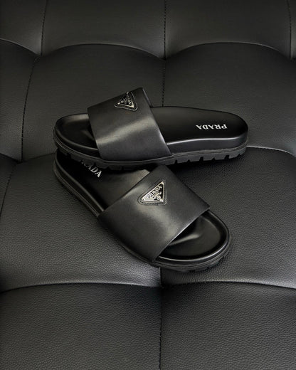 Prada Nappa Leather Padded Slides "Black"