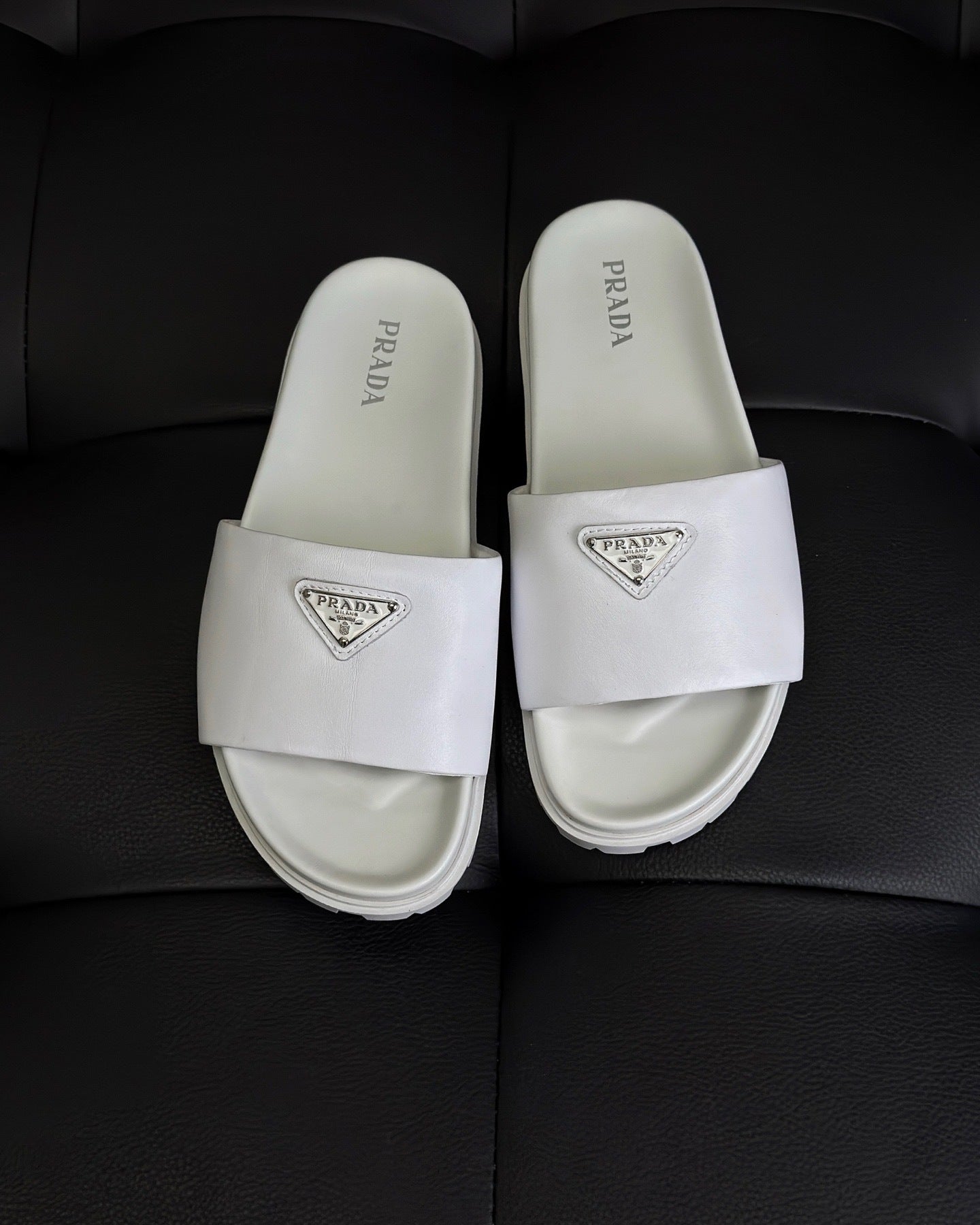 Prada Nappa Leather Padded Slides "White"