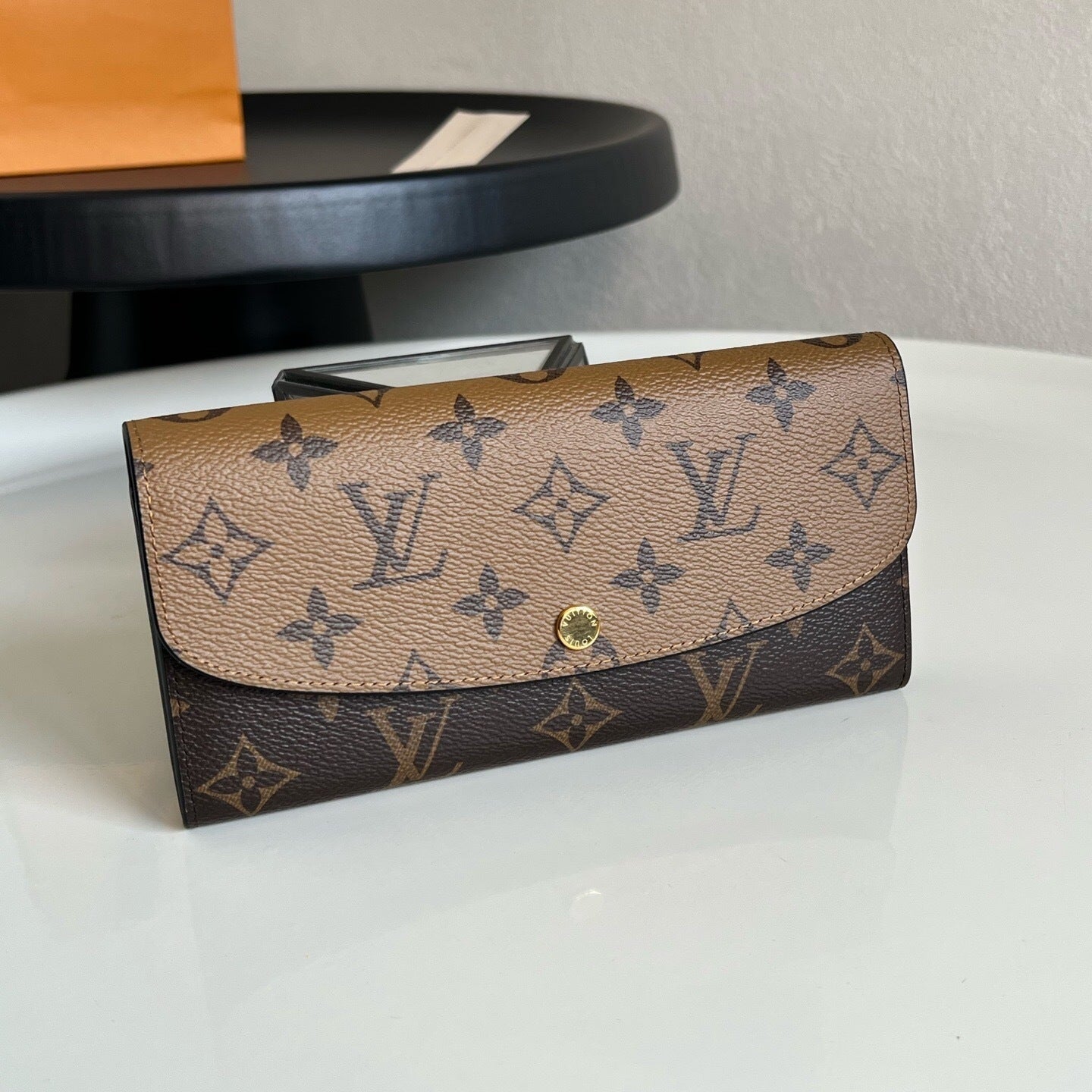 Louis Vuitton Emilie Wallet "Monogram Reverse"