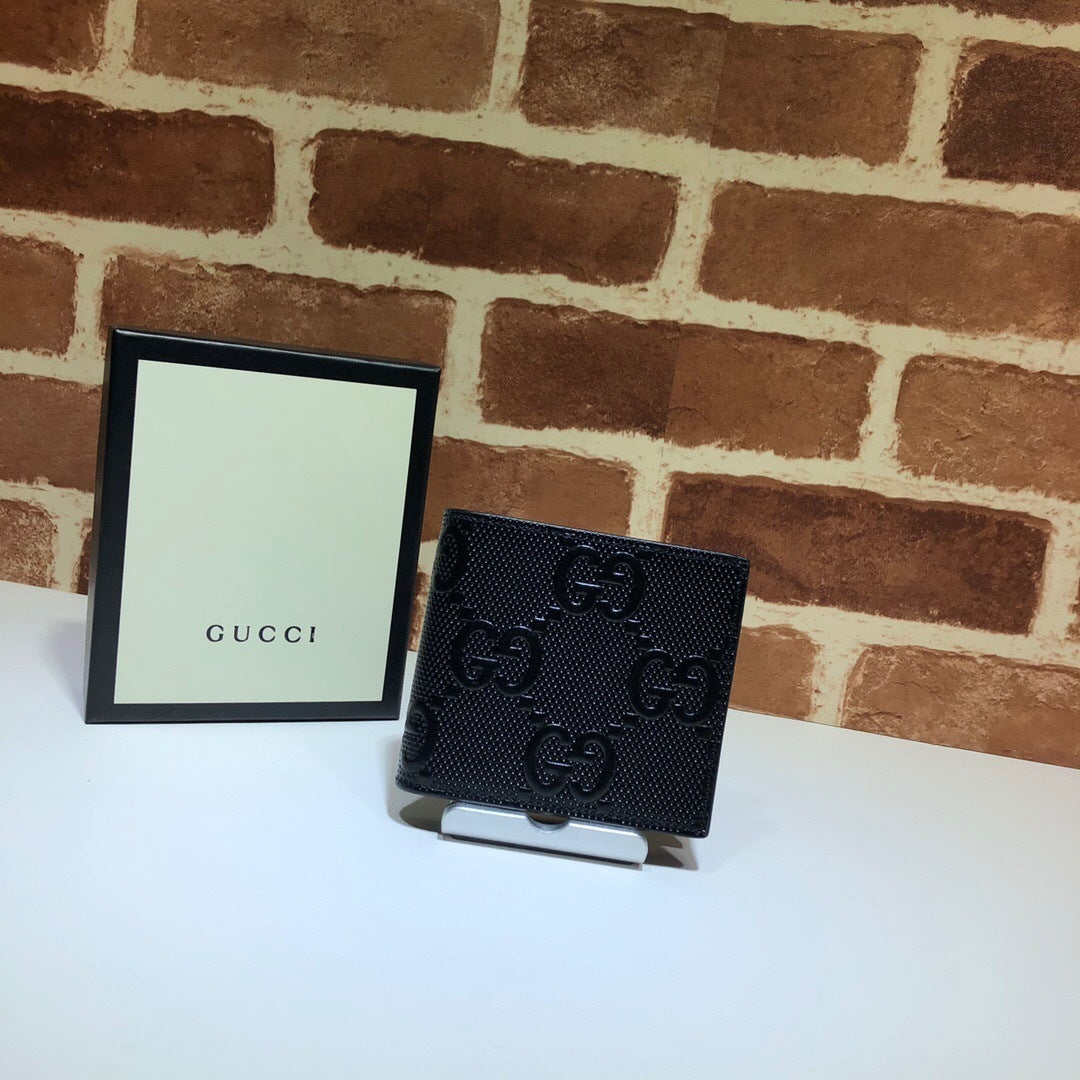 Gucci Textured Leather GG Embossed Bifold Wallet