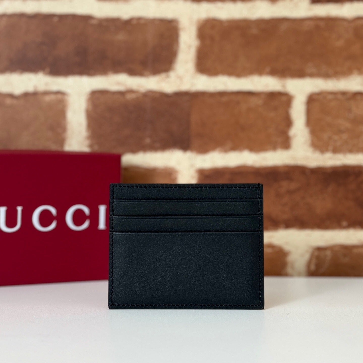 Gucci GG Emblem Embossed Card Case