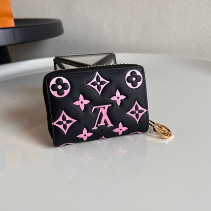 Louis Vuitton Lou Wallet "Monogram Embossed Leather"