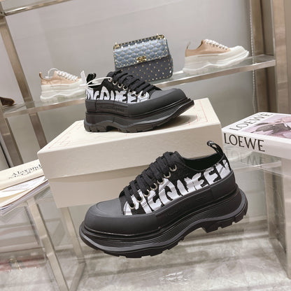 Alexander McQueen Tread Slick Low "Black-White Graffiti Logo"