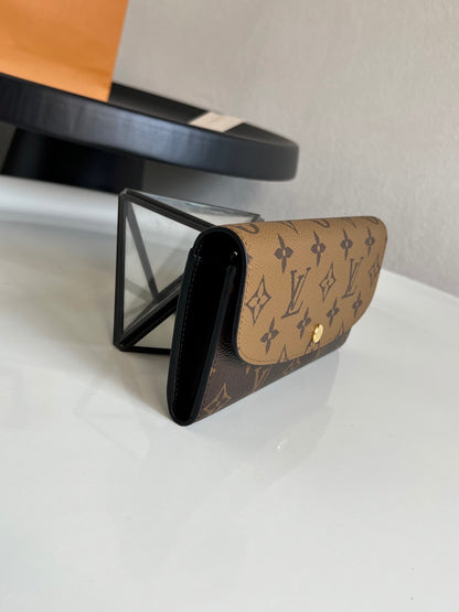 Louis Vuitton Emilie Wallet "Monogram Reverse"