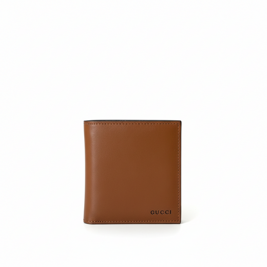 Gucci GG Emblem Bi-Fold Embossed Leather Wallet