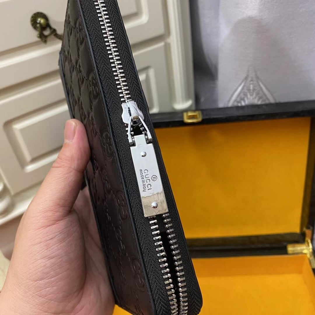 Gucci GG Leather Embossed Zip Around Wallet