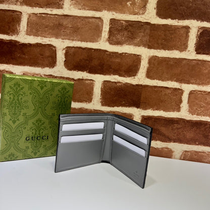 Gucci Textured Leather GG Embossed Bifold Wallet