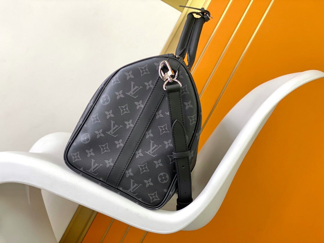Louis Vuitton Keepall Bandoulière 55 Duffel Bag