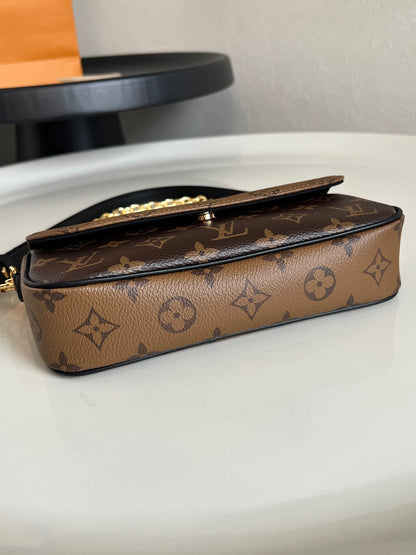 Louis Vuitton Wallet On Chain Ivy "Monogram Reverse"