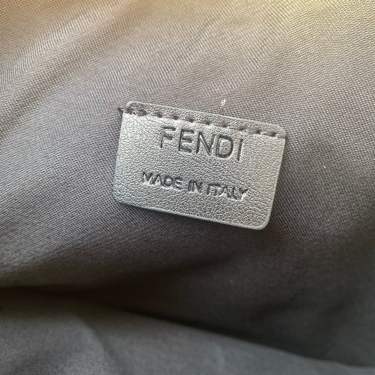 Fendi FF Embossed Leather Clutch Bag