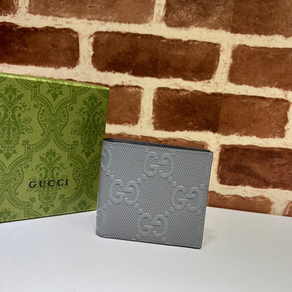 Gucci Textured Leather GG Embossed Bifold Wallet