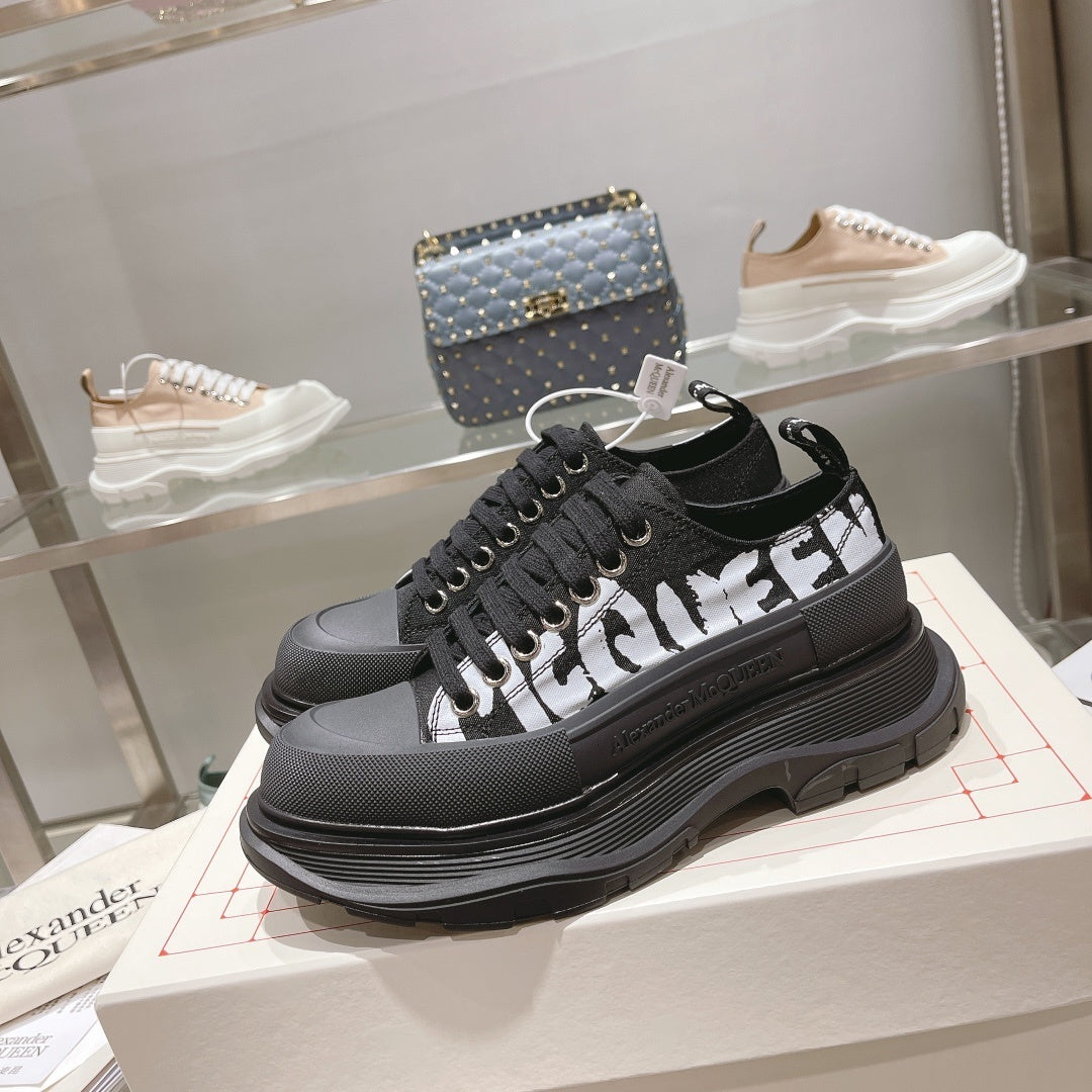 Alexander McQueen Tread Slick Low "Black-White Graffiti Logo"