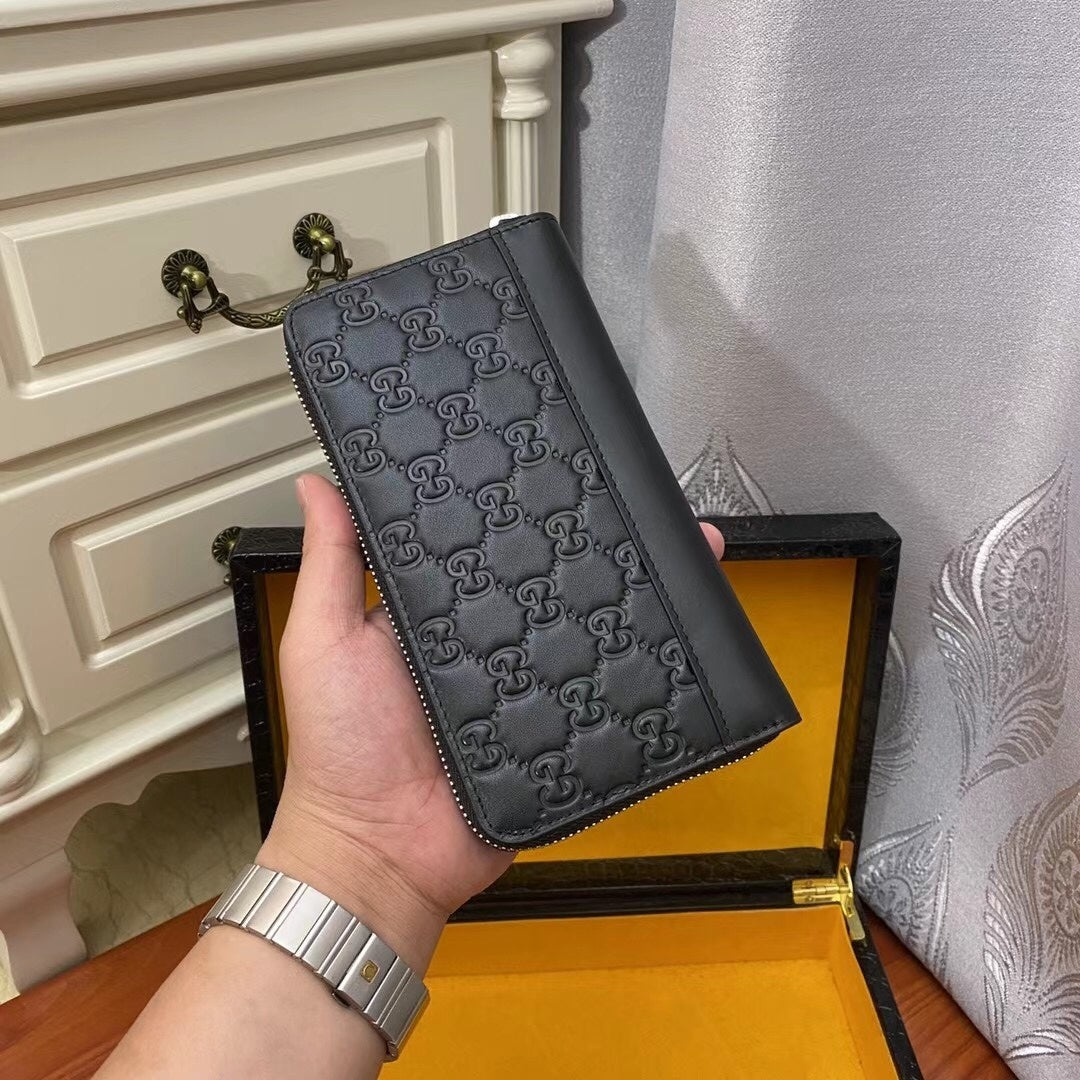 Gucci GG Leather Embossed Zip Around Wallet