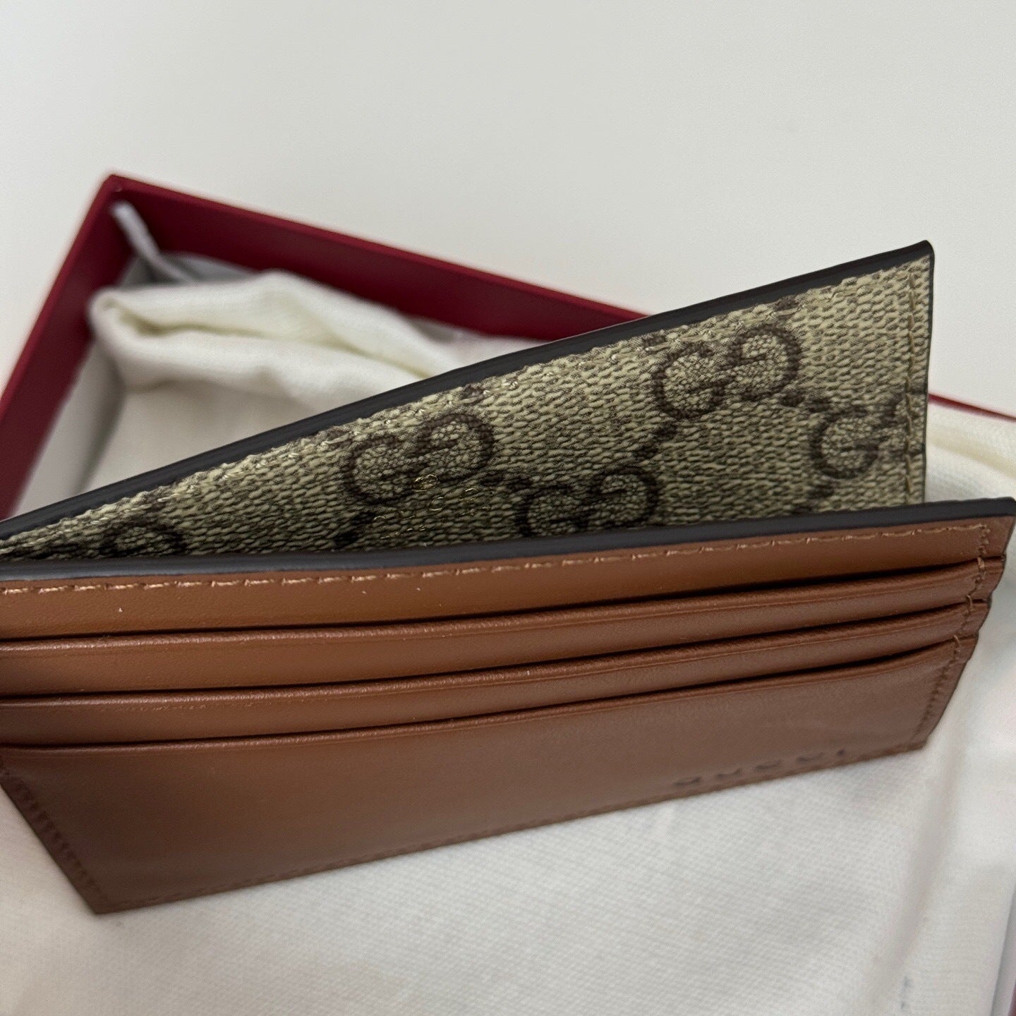Gucci GG Emblem Embossed Card Case